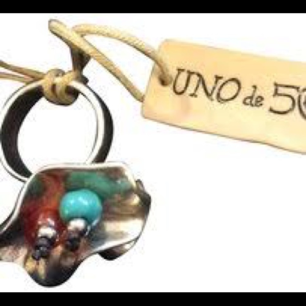 ISO Uno de 50 Ring - Picture 1 of 5